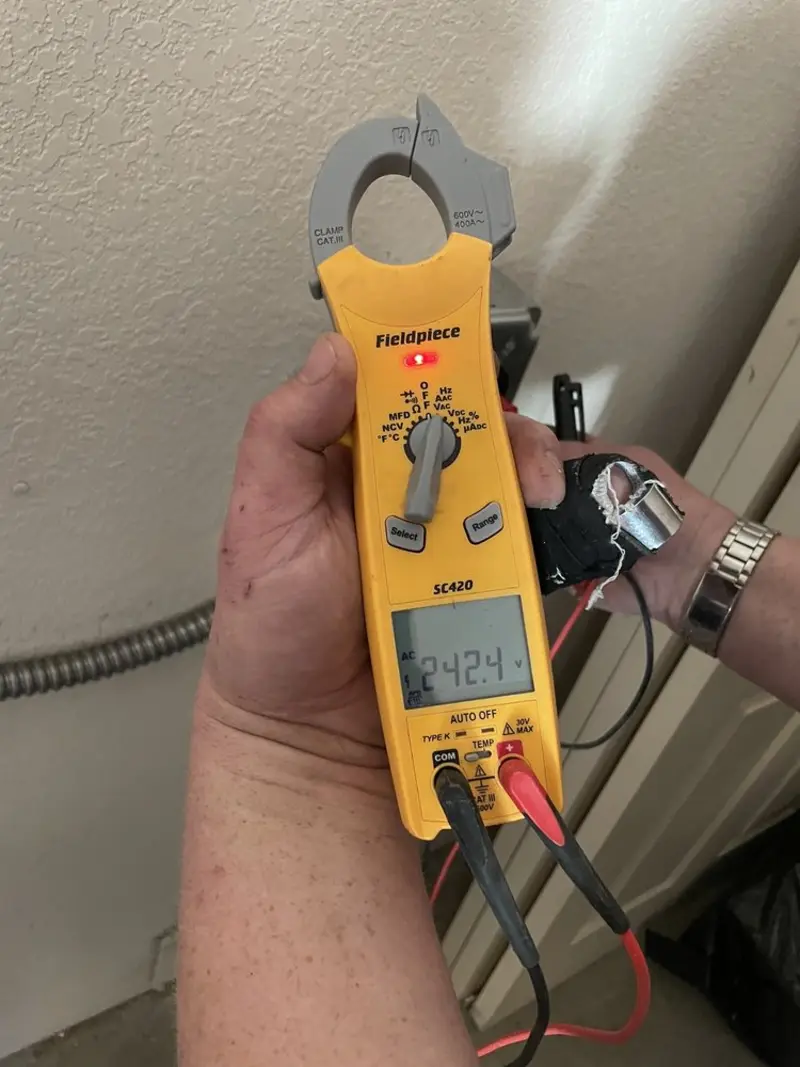 Voltage testing with clamp meter during Hot Tub / Pool Electrical Wiring in Toms River
